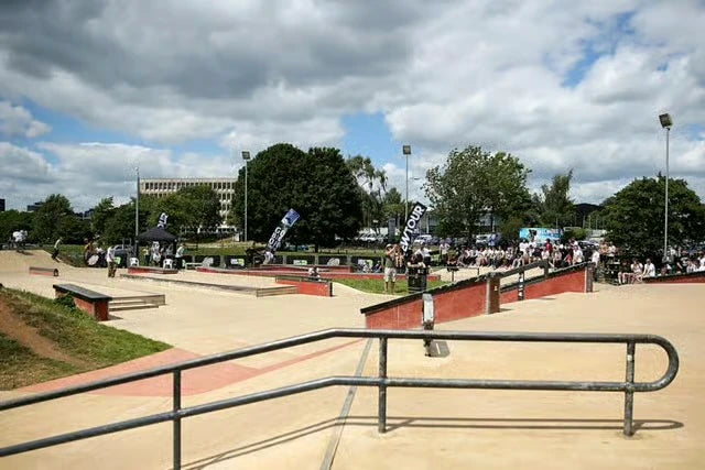 Original photograph of Radlands Skate Plaza with its concrete ramps, rails, event tents and riders
