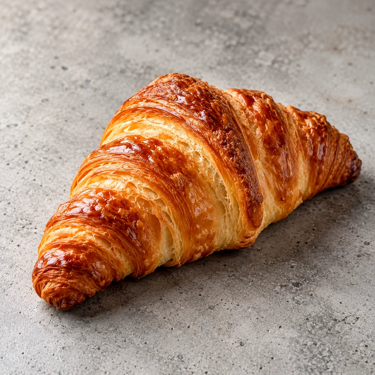 Freshly baked golden croissant